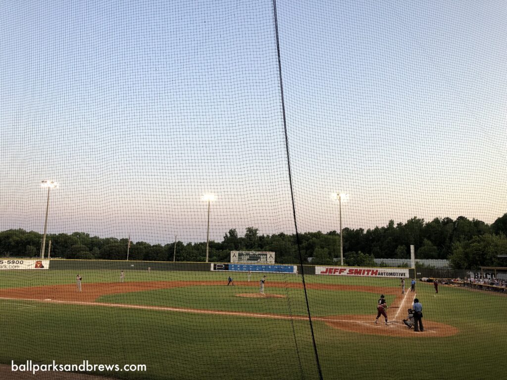 A batter swings at a pitch, Luther Williams field.